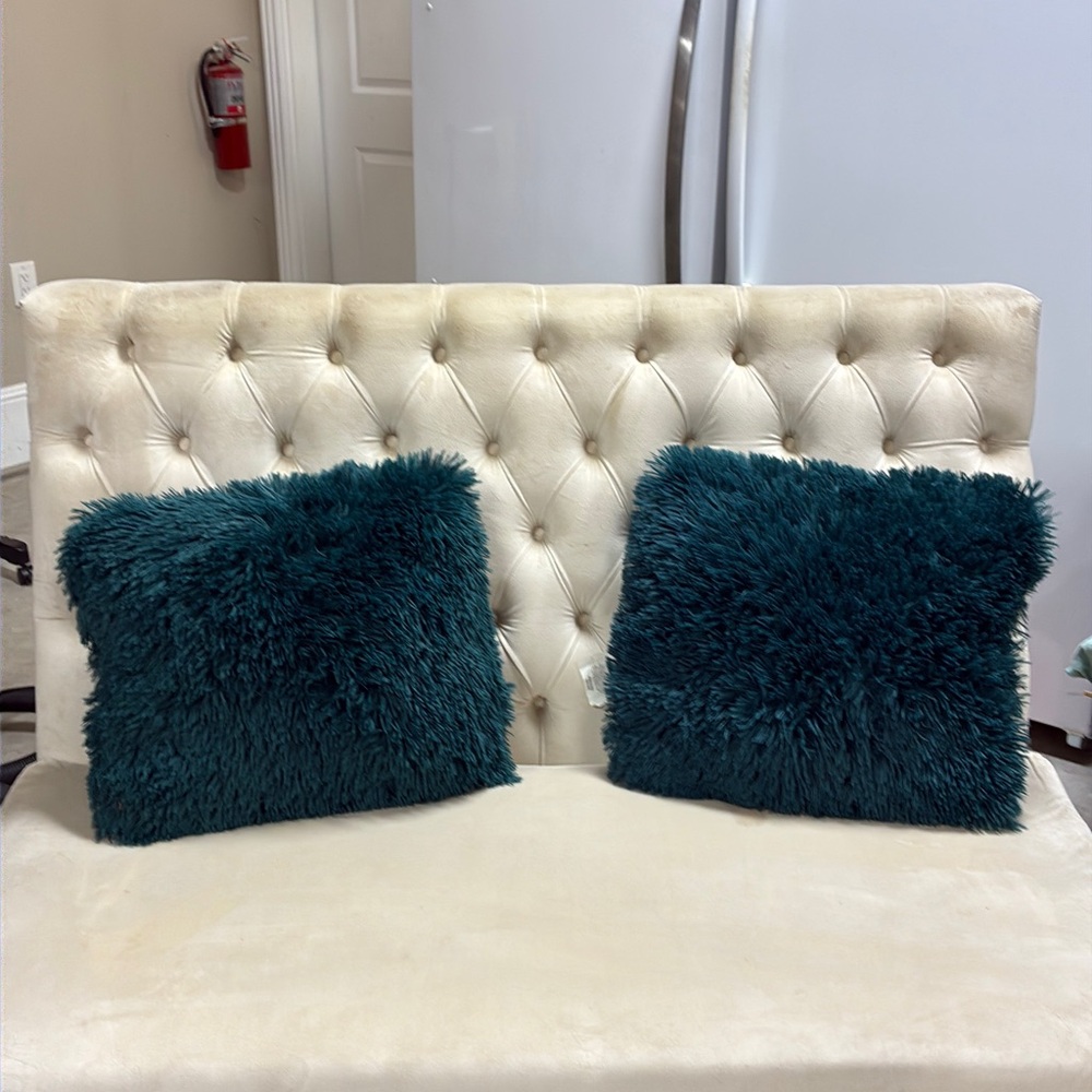 Teal fluffy pillows